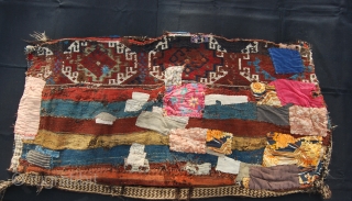 East Anatolian cuval in original condition after a long and heavy duty use. With tens of patches outside and inside. Size is cm 70x140 ca. I bought it about 30/35 years ago  ...