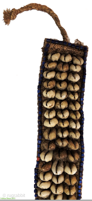 Africa! Congo. 
Kuba people belt. 
Raffia, cowry shells, glass beads. 
Kuba people belt (mukody mu-ikup lakiing). 
Democratic Republic of Congo. First half 20th century. 
A wonderful tribal art example made of raffia,  ...