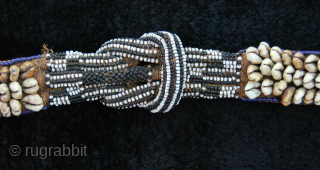 Africa!
African ethnic art!
Congo/Zaire!

Kuba people belt (mukody mu-ikup lakiing). Congo. First half 20th century. a wonderful tribal art example made of raffia, cowry shells and glass beads. These objects were worn in ceremonial  ...