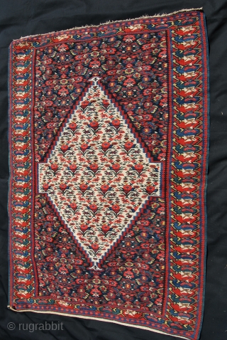 This is a great kilim. Some say it's a Bidjar, others stick to Senneh. In any way it's simply a wonderful textile example of tribal art.  
Cm 105x150. Second half 19th  ...