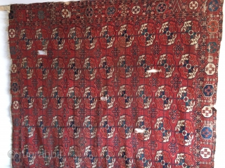 Turkmen Tekke main rug. Cm 200x222 ca. Mid 19th c. Very very thin. With a fantastic border. All wool. Several condition issues and unluckily far too fine to be restored, but at  ...