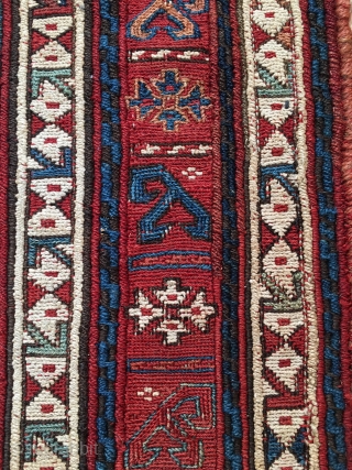 Shahsavan/Khamseh sumack saddle bag face. Cm 48x65. End 19th c. Great saturated colors. Very interesting diamond lattice main field with a repeating cruciform motif. Three, probably even more interesting borders with stylized  ...