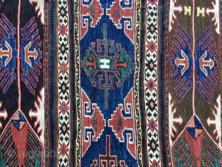 Shahsavan Eagle sumack mafrash end panel. Cm 44/49X57. Datable 1880/1890sh. Rare eagle pattern. Very fine and very very tight weave. White is cotton. The colors are magnificent, natural and deeply saturated: chestnut,  ...