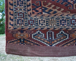 Yomut small rug. Cm 105x180 ca. Early 20th c. Great condition, full pile. Dyrnak gul pattern, Yomut eagles in the elems. a date? or an inscription? in the in the top left  ...