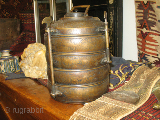 Beautiful, very rare Osmanli work of art. 
Ottoman 19th century or earlier brass safertas or food container. 
Cm 17x23h. 
Heavily decorated. 
Really rare & wonderful. 
In very good condition. 
Few similar examples  ...