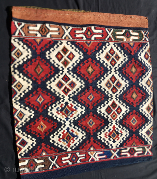 Sinanli tribal group. 
Malatya area. Eastern Anatolia. Turkey. 
Big khorjin or saddle kilim bag. 
Cm 74x158. End 19th/early 20th century. 
Highlights: great graphics, fantastic colors, a wonderful, deeply saturated cochineal, a sweet,  ...