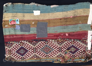 Straight from the nomad's tent. East Anatolian cuval or storage bag. Cm 75x120. 100 years old or so. Complete and with all the patches in the world. Great natural saturated colors. An  ...