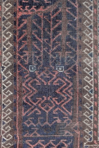 Baluch (prayer rug?); end 19th c.; study piece with a for me unusual border, 
low pile, unfortunately with heavy, ugly running blue ink „re-colouration“ last picture is its back side
   