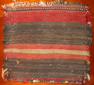 Small southern persian bag, 19th c., 30x28cm. Flatweave with knotted surroundings and striped kilim backside.Condition is well to see on the pics.           