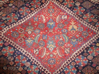 Antique South West Persian Qashqai rug, with triple latch hook medallion design, outstanding drawing and colour. The medallion is surrounded by a field filled with floral rosettes and tribal design elements. Note  ...