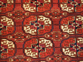 Antique Tekke Turkmen rug of small size with excellent colour. www.knightsantiques.co.uk 
Size: 4ft 8in x 3ft 7in (142 x 108cm).
Circa 1880.

The rug has three rows of seven Tekke guls, these are will  ...