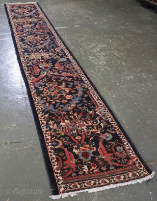 Antique Mahal runner of a very scarce narrow width.
www.knightsantiques.co.uk
Circa 1900.
Size: 14ft 11in x 2ft 5in (455 x 73cm).
The runner has a colourful feel with a classic large scale floral design on a  ...