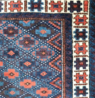 an old Baluch square, with great wool and lots of juicy aubergine dye. Not sure if its a big bag or a rug...? 79x75cm         