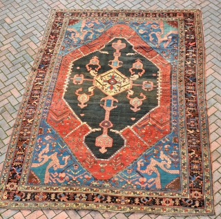 An antique Bakshieesh carpet, super fine weave with strong graphics. virtually untouched condition with even low pile some local wear, unusually, it has its ends and sides. A beautiful piece that fresh  ...