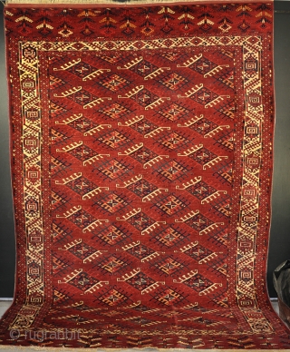 A very fine antique yomud main. Super saturated dyes, densly knotted with thick greasy pile. Some silk highlights and silk sides. A few small faded repairs, but otherwise in excellent comndition with  ...