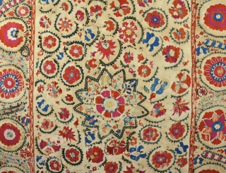 Antique Suzani, some rubbed areas and damage to linin ground, but professionally conserved and backed. Mid 19th century.               