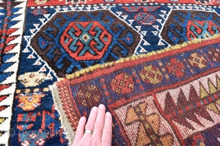 An antique Sinjabi Kurdish rug from North West Persia. A beautiful tribal rug with glowing natural dyes and good wool. Both decorative and collectable, this wonderful old rug is in exceptional condition  ...