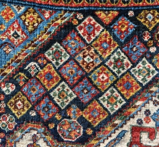 A beautiful antique qasgai rug with a design more commonly found on bigger carpets. Some old, high quality repair, a few lower areas, but generaly in good order. 176 x 101cm  