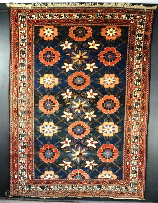 An unusual veremin(?) rug with bold minakhani design. Full pile all over a little faded repair on one extreme end. Lovely size.218x161cm           