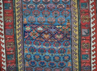 Unusual SaugBulag runner, very long and narrow, with vivid dyes. Quite a lot of decent quality reweave, but clean and floor ready. 548x89cm. Mid 19th century.       