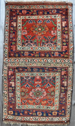 A Pair of antique Kurdish bag faces with great depth of colour and shiny wool. One bag has little lions on it. Slight losses to sides, decent pile. The two faces joined  ...