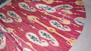 19th century Uzbek Adras Silk wrap/ cotton weft Ikat Chapan ( Coat). Excellent natural colours and bodom gul (almond) design. Beautiful linen, spectacular cross stitches on neck part edges. Reasonable price.   ...