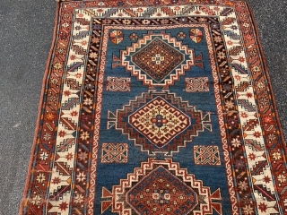 Caucasian Kazak, circa 1900, 4-4 x 8-8 (112 x 190), good condition, rug was washed, wear, few creases, one end original braiding finish, moth bites, browns oxidized, plus shipping.    