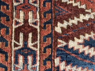 Yomud Turkoman Asmalyk, late 19th century, 2-1 x 3-8 (64 x 112), rug was hand washed, good pile, left edge has long  tare, 4-5 small holes, 4 green silk highlights in  ...