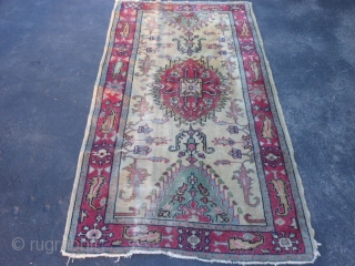 Turkish Oushak, circa 1920, 3-7 x 6-3 (1.09 x 1.90), wear, end loss, rug has been washed, plus shipping.              