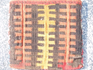 Persian Lori/Bakhtiar Chanteh Soumak bag, 7" x 7", late 19th century, weft wrapping technique, small discolored area top left border, good condition, comb design kilim back, nice colors.     