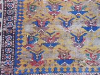 Caucasian Soumac fragment, late 19th century, 2-5 x 3-8 (.74 x 1.12), great greens and yellow, cut and rejoined, worn, holes, rug was washed, plus shipping.       
