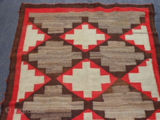 Navajo Transitional, early 20th century, 4-2 x 6-0 (1.27 x 1.83), no dye run, no stains, hole and weak area one end, 2 small holes on edge, could use a cleaning, plus  ...