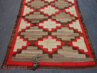 Navajo Transitional, early 20th century, 4-2 x 6-0 (1.27 x 1.83), no dye run, no stains, hole and weak area one end, 2 small holes on edge, could use a cleaning, plus  ...