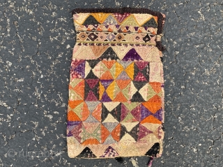 Uzbek purse,  early 20th century,  5” x 8” (13 x 20), both sides different, some fading,  cotton/silk, plus shipping.           