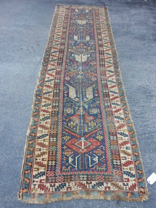 Caucasian Shirvan runner,  3-1 x 10-8 (.94 x 3.25),  circa 1870, great colors, wear, both edges rough in places, one end missing minor guard border, browns and blacks oxidized, many  ...