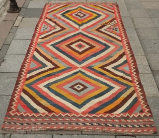 Qashqa'i kilim, 19th/early 20th century. Evocative concentric diamonds in variegated natural dyes. An abstract work of art.  Playfully place small diamond motifs. Some small areas of wear shown in the images.  ...