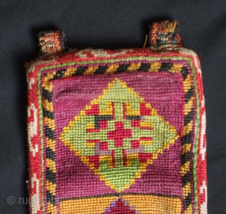 Uzbekistan Lakai silk cross stitch belt, 19th century. Great lively colors.  It even still has the silk knotted "buttons" on the bottom end.  11 x 87 cm    