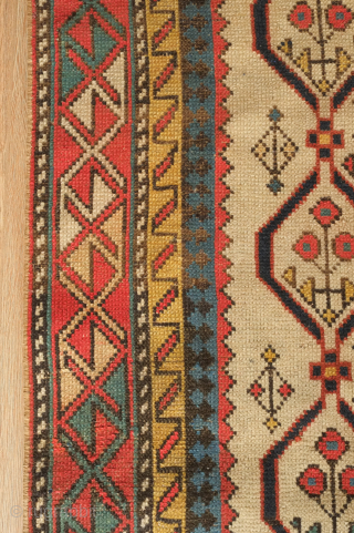 Shirvan small rug in square-like format, 19th century.  This rug was woven in an unusual format without the mihrab. The lattice scheme is populated with a variety of floral motifs. It  ...