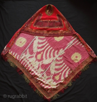 Karakalpak Wedding Dress, 3rd/4th quarter of 19th century. Silk embroidery on felt broadcloth with an original ikat back.  In excellent condition with some slight moth nibbles in one area of felt.  ...