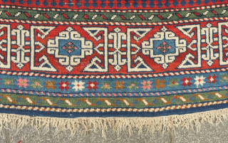 Kuba rug, 19th century.  Stunning saturated colors.  This Kuba rug is brimming with a variety of palmettes and medallions. Striking kufic border. Excellent condition. 128 x 213 cm.  Contact  ...