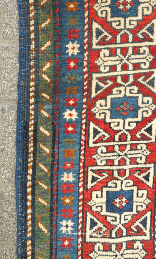 Kuba rug, 19th century.  Stunning saturated colors.  This Kuba rug is brimming with a variety of palmettes and medallions. Striking kufic border. Excellent condition. 128 x 213 cm.  Contact  ...