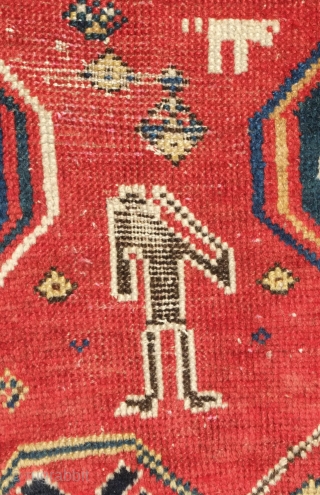 Borchalu Kazak rug, 19th century. Archaic trees inside medallions. There is a headless human figure at the bottom of the rug. Some wear in the center but good pile all around the  ...