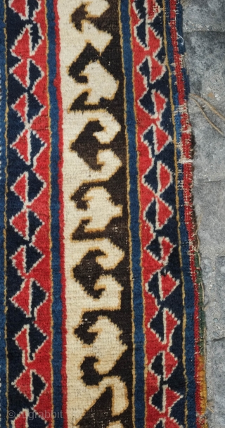 Borchalu Kazak rug, 19th century. Archaic trees inside medallions. There is a headless human figure at the bottom of the rug. Some wear in the center but good pile all around the  ...
