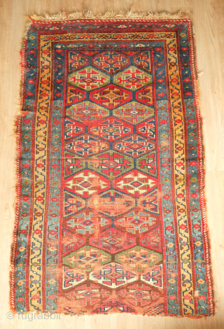 Sauj Bulak fragment, 19th century.  Absolutely fantastic saturated natural colors and silky soft wool. A mesmerizing piece even as it is. 111 x 183 cm       