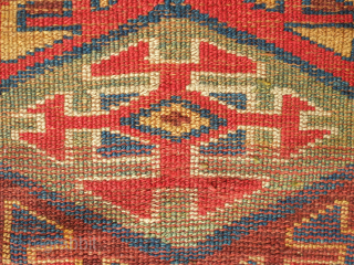 Sauj Bulak fragment, 19th century.  Absolutely fantastic saturated natural colors and silky soft wool. A mesmerizing piece even as it is. 111 x 183 cm       