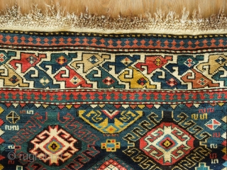 Shirvan Runner, 3rd to 4th Quarter of the 19th Century. Fantastic colors.  Hooked medallion aligned in two columns.  The rug has some worn spots and a section at the bottom  ...