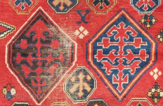Borchalu Kazak rug, 19th century. Archaic trees inside medallions.  There is a headless human figure at the bottom of the rug.  Some wear in the center but good pile all  ...
