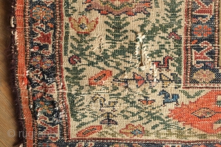 Malayer Rug, 3rd quarter of 19th century.  Abrash and lines bisecting the field.  The red in the elegantly articulated border flowers is not chemical and is madder dyed using a  ...