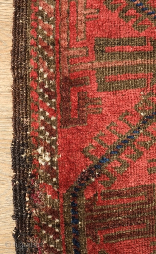Timuri Baluch Rug, 3rd to 4th Quarter of the 19th Century. The design is in a repeat kalamdani (pen case) or centipede design. The border is an abstracted Yomut boat border originally  ...