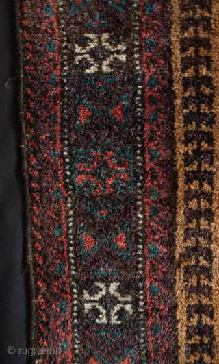 Baluch Balisht.  Sistan or Adraskand. Late 19th/early 20th century.  Tree of life motif with alternating colors in the hooks giving the piece a dynamic motion. Deep purple throughout and camel  ...